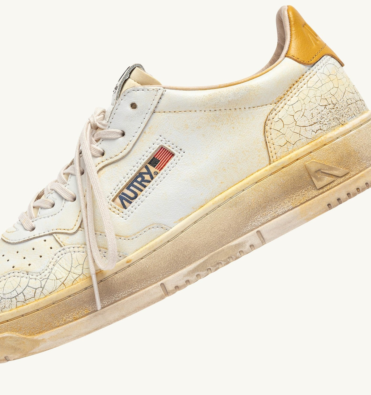 AUTRY MEDALIST LOW SUPER VINTAGE SNEAKERS IN WHITE AND YELLOW LEATHER
