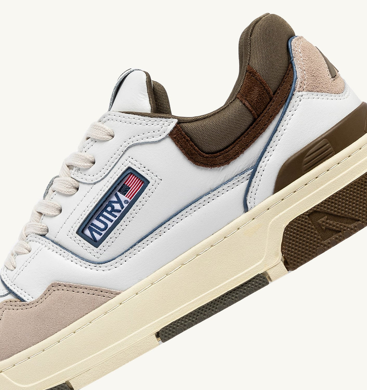 AUTRY CLC LOW SNEAKERS IN WHITE AND COVERT GREEN LEATHER SUEDE