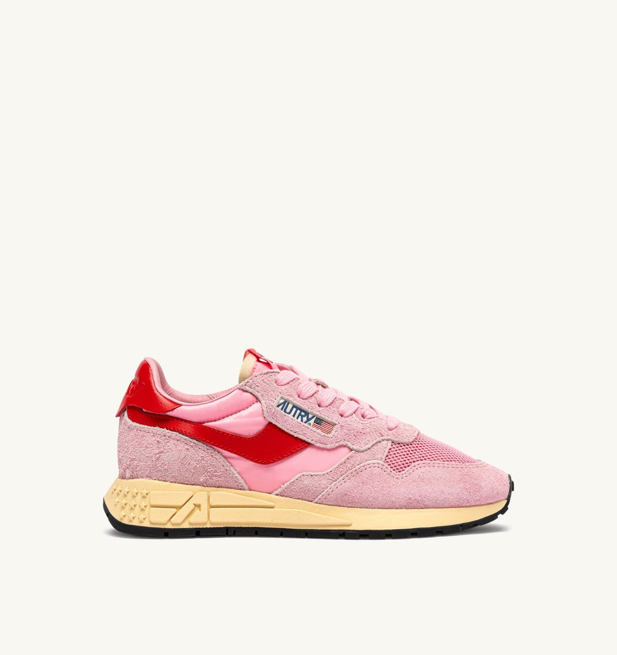 AUTRY REELWIND LOW SNEAKERS IN PINK CHERUB AND FLAME SCARLET NYLON AND SUEDE