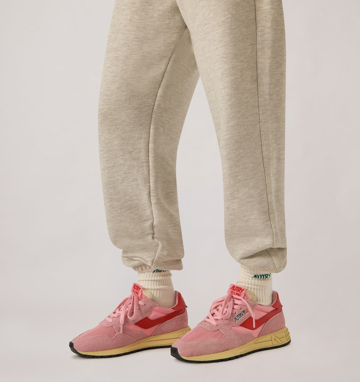 AUTRY REELWIND LOW SNEAKERS IN PINK CHERUB AND FLAME SCARLET NYLON AND SUEDE