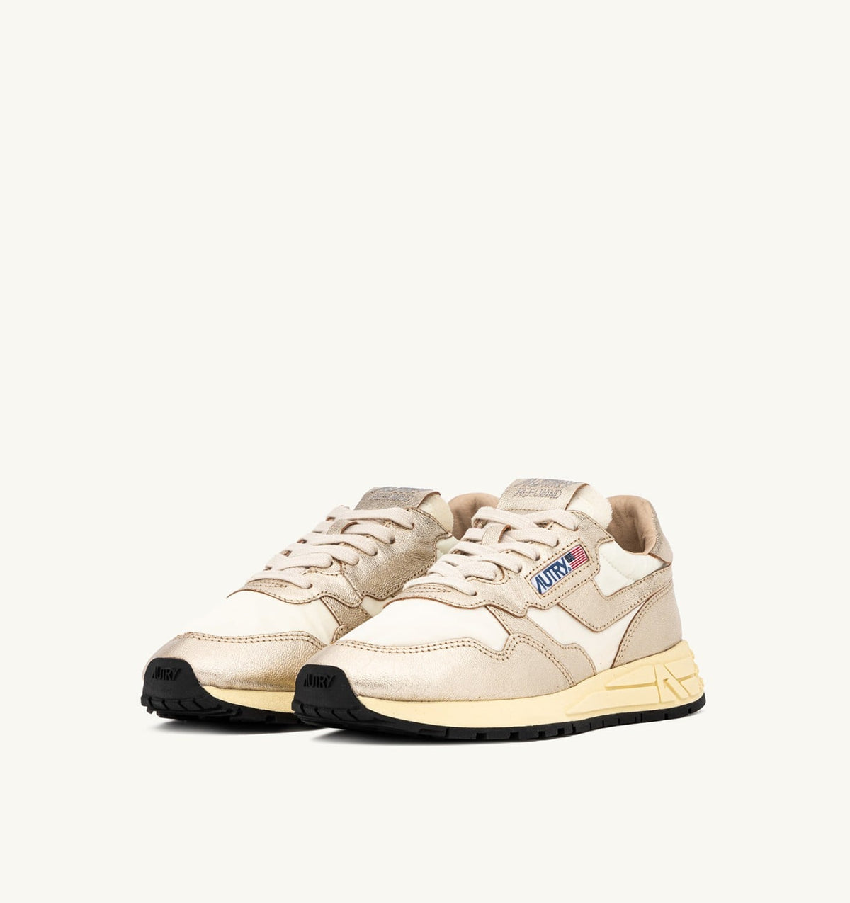 AUTRY REELWIND SNEAKERS IN GOLD- TONE NYLON AND METALIZED LEATHER