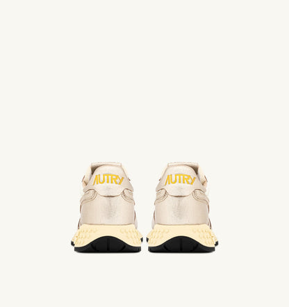 AUTRY REELWIND SNEAKERS IN GOLD- TONE NYLON AND METALIZED LEATHER