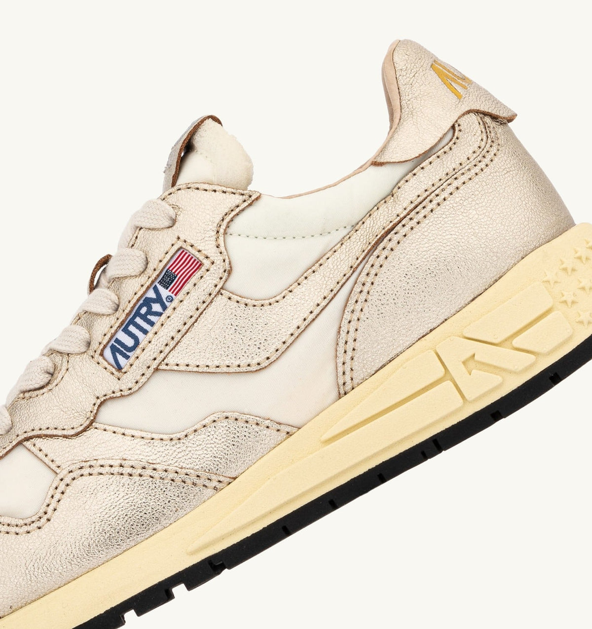 AUTRY REELWIND SNEAKERS IN GOLD- TONE NYLON AND METALIZED LEATHER