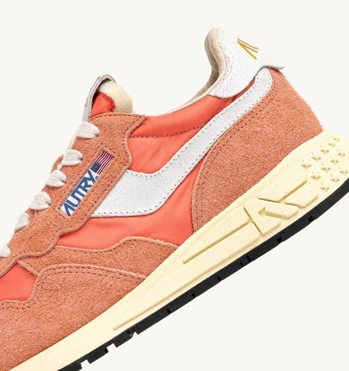 AUTRY REELWIND LOW SNEAKERS IN WHITE AND PEACH PINK NYLON AND SUEDE