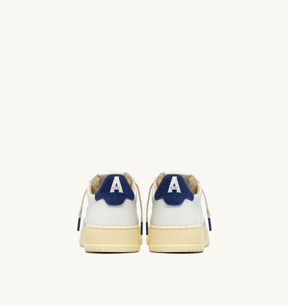 AUTRY MEDALIST LOW SNEAKERS IN WHITE LEATHER AND BLUE DEPTHS SUEDE