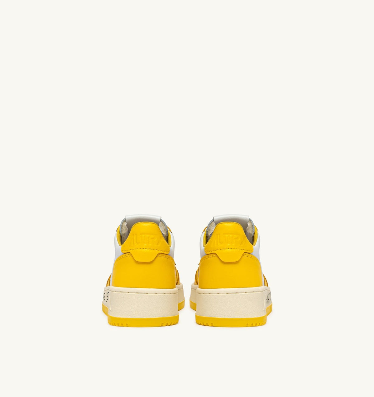 AUTRY MEDALIST LOW SNEAKERS IN WHITE AND SLICKER LEATHER WITH LETTERING