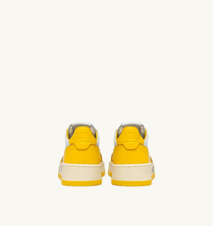 AUTRY MEDALIST LOW SNEAKERS IN WHITE AND SLICKER LEATHER WITH LETTERING