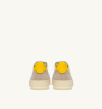 AUTRY MEDALIST LOW SNEAKERS IN WHITE LEATHER AND SLICKER SUEDE WITH LETTERING