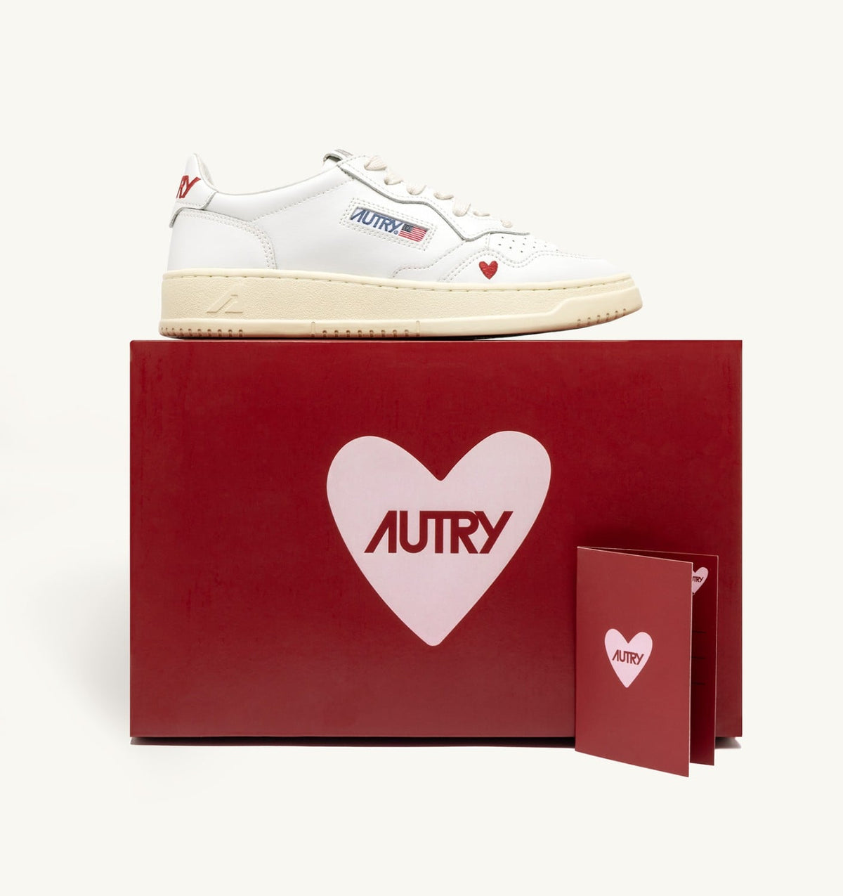 AUTRY SNEAKERS MEDALIST 'LOVE' IN WHITE AND RED LEATHER