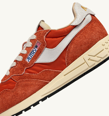 AUTRY REELWIND LOW SNEAKERS IN WHITE AND ORANGE RUST NYLON AND SUEDE