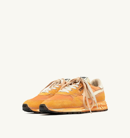 AUTRY REELWIND SUPER VINTAGE SNEAKERS IN WHITE AND ORANGE SUEDE AND NYLON