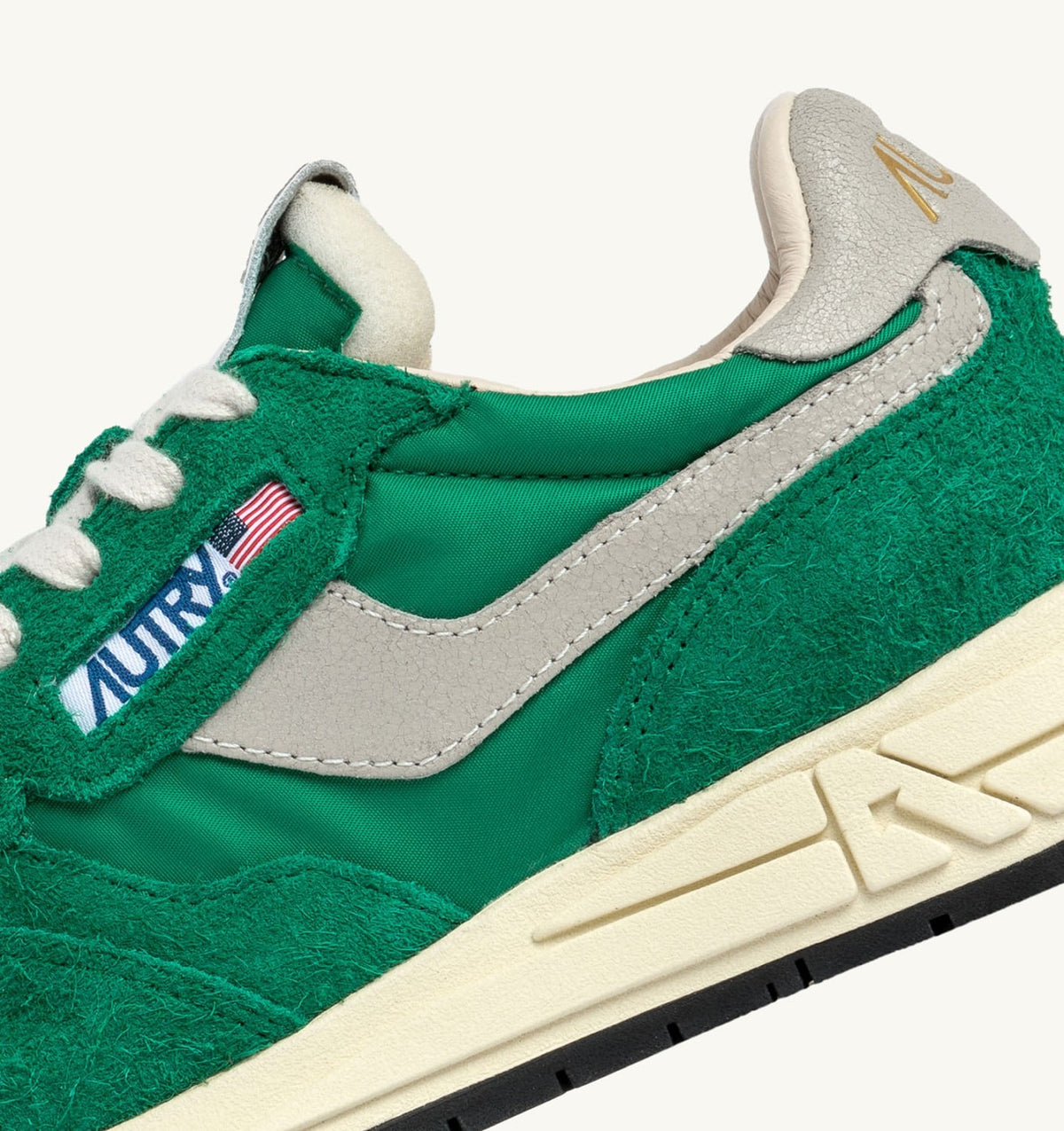 AUTRY REELWIND LOW SNEAKERS IN GREEN NYLON AND SUEDE