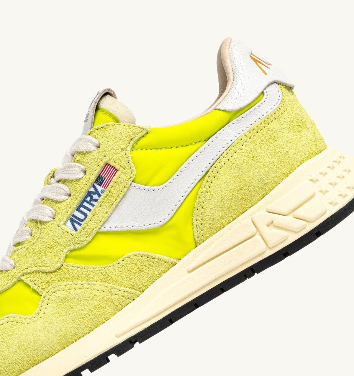 AUTRY REELWIND LOW SNEAKERS IN WHITE AND EVENING PRIMROSE NYLON AND SUEDE