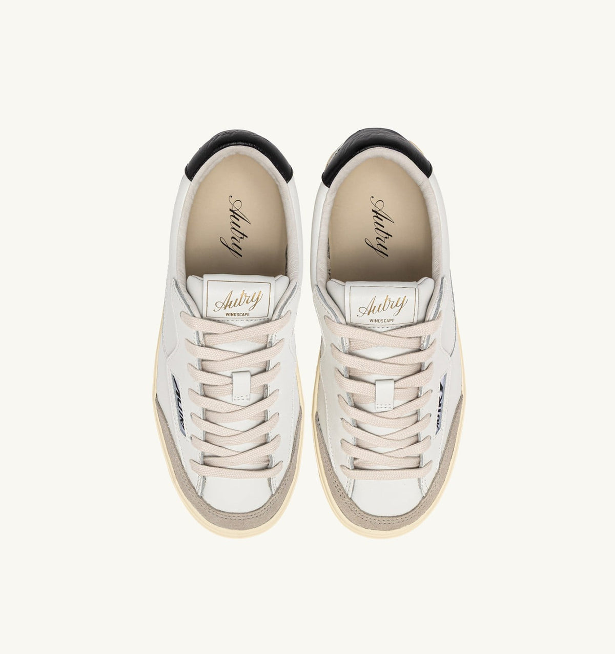 AUTRY WINDSCAPE LOW SNEAKERS IN WHITE AND BLACK LEATHER