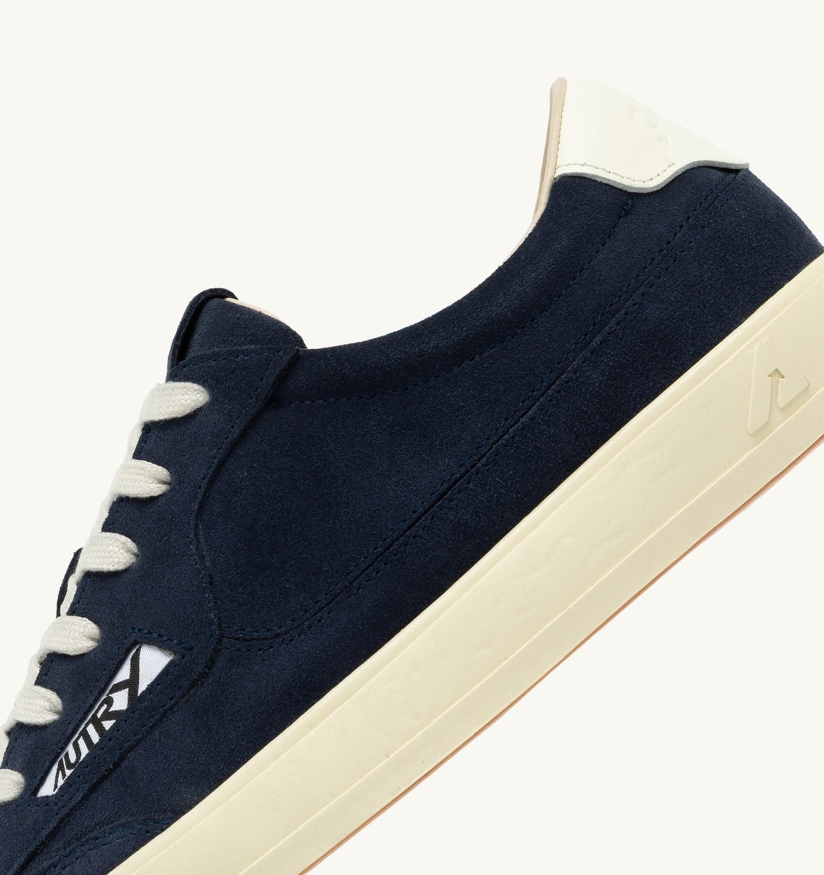 AUTRY WINDSCAPE LOW SNEAKERS IN NAVY AND MARSHMALLOW SUEDE