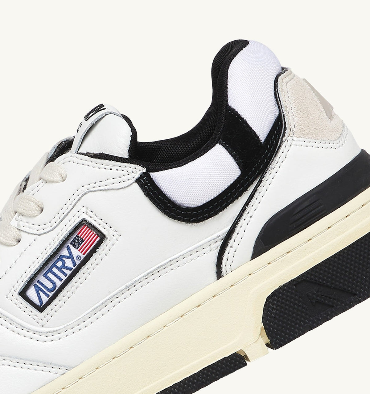 AUTRY CLC LOW SNEAKERS IN WHITE LEATHER AND BLACK SUEDE