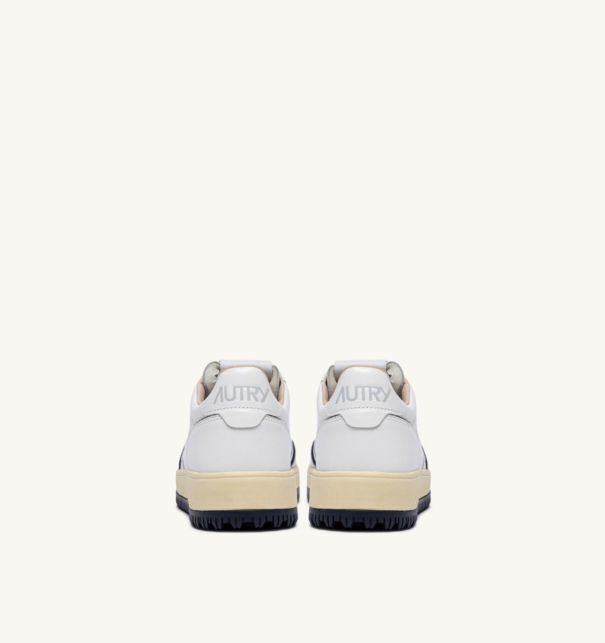 AUTRY GOLF LOW SNEAKERS IN WHITE AND NAVY LEATHER