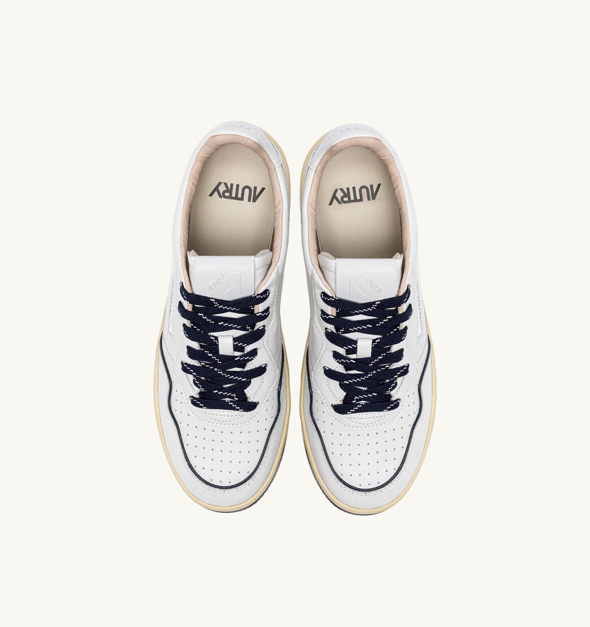 AUTRY GOLF LOW SNEAKERS IN WHITE AND NAVY LEATHER