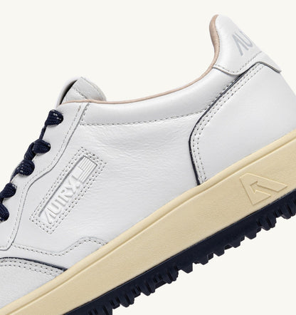 AUTRY GOLF LOW SNEAKERS IN WHITE AND NAVY LEATHER