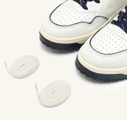 AUTRY GOLF LOW SNEAKERS IN WHITE AND NAVY LEATHER