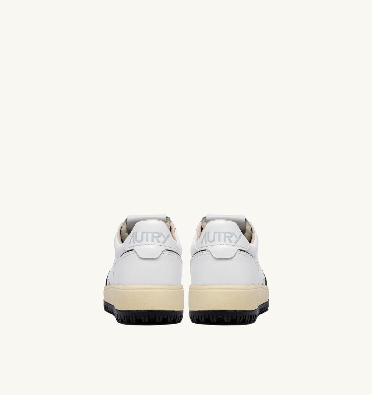 AUTRY GOLF LOW SNEAKERS IN LEATHER COLOR WHITE AND BLACK