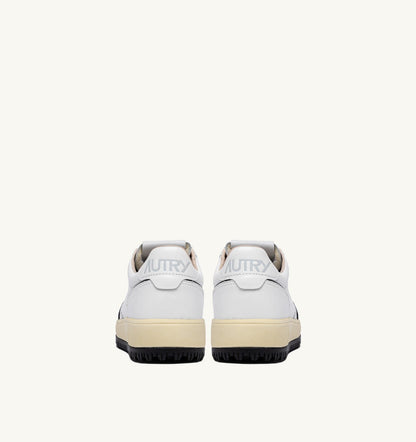AUTRY GOLF LOW SNEAKERS IN LEATHER COLOR WHITE AND BLACK