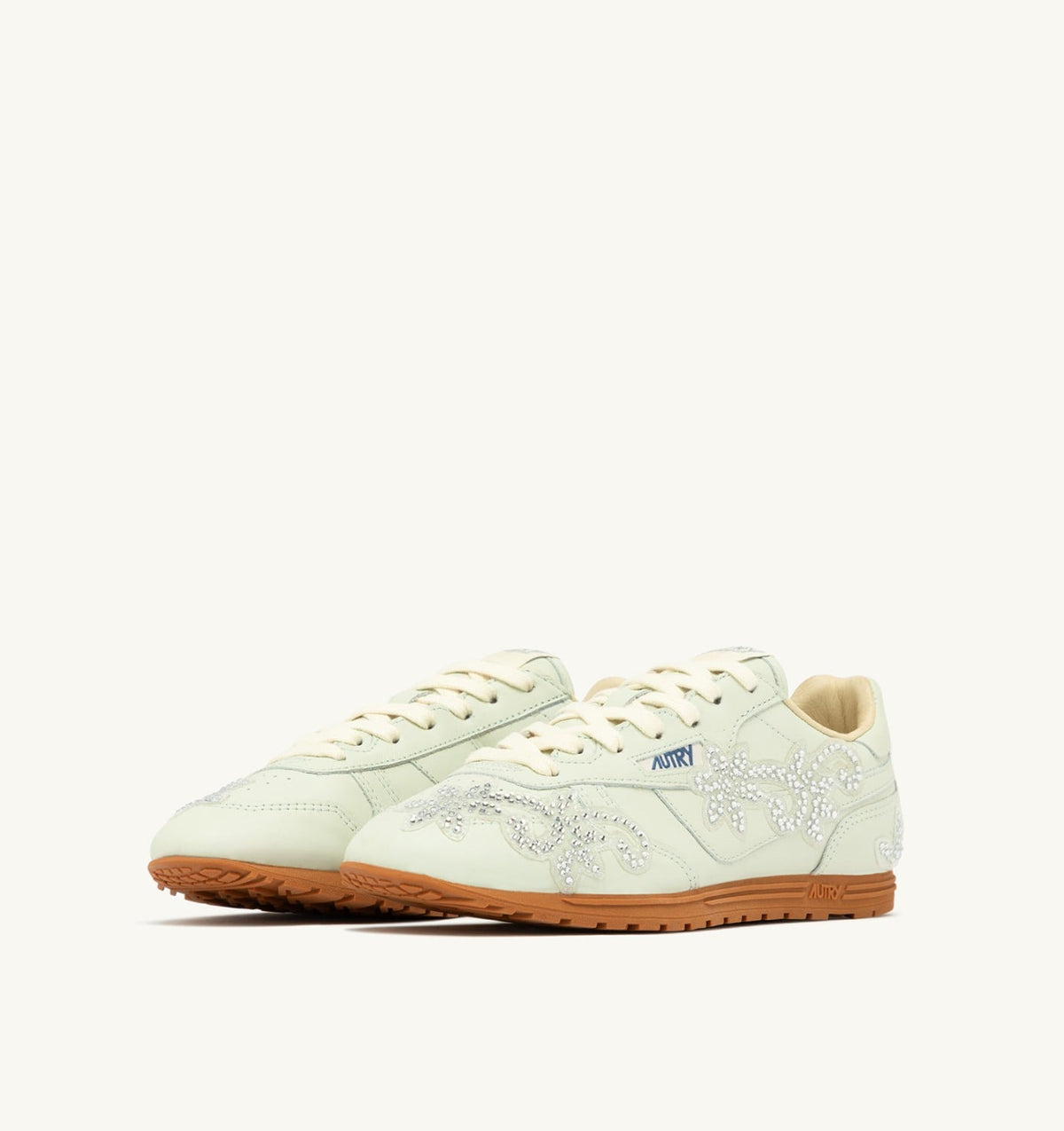 AUTRY WINDSPIN SNEAKERS IN BONE WHITE LEATHER WITH DECORATIONS