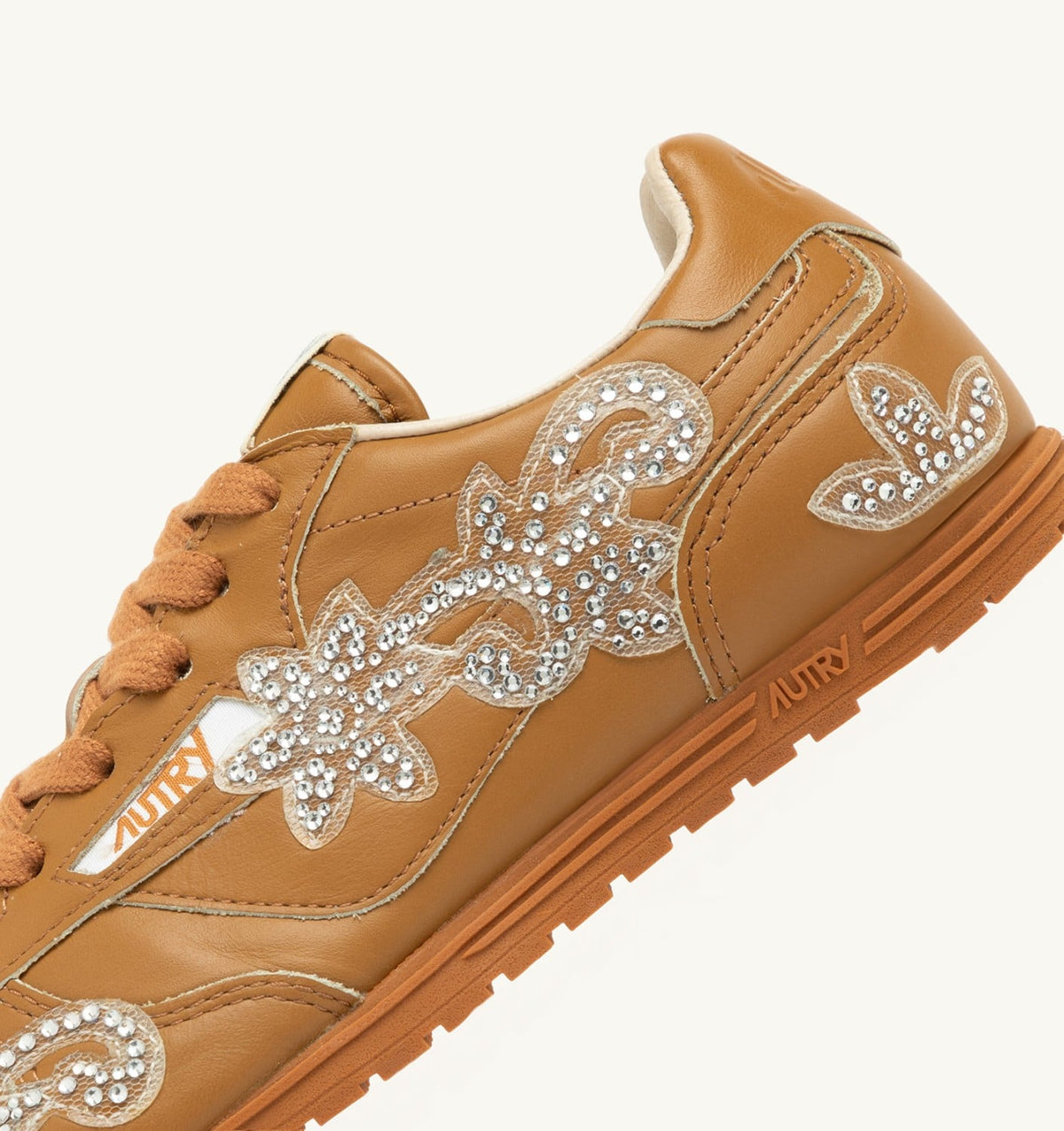 AUTRY WINDSPIN SNEAKERS IN EARTH LEATHER WITH DECORATIONS