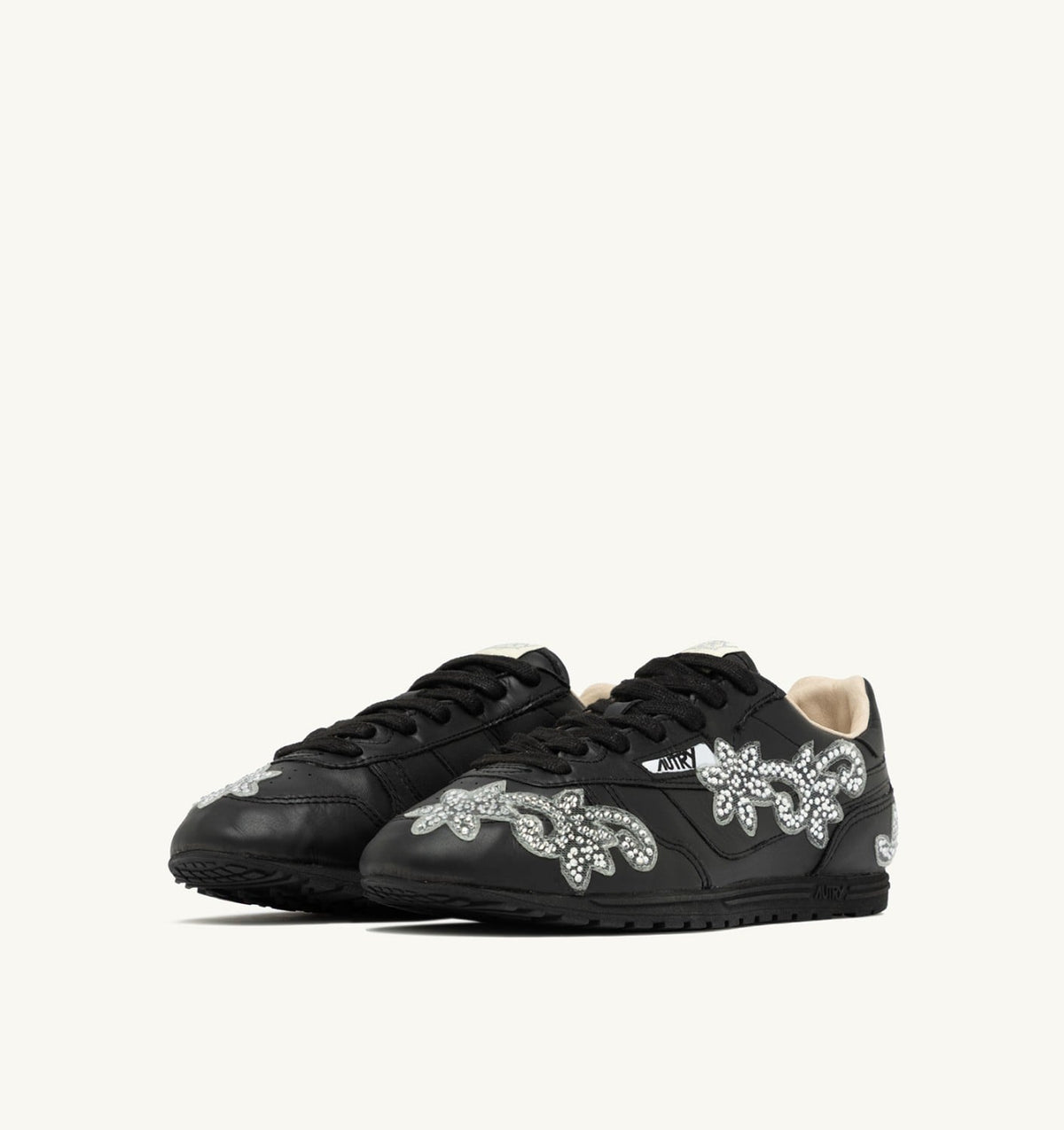 AUTRY WINDSPIN SNEAKERS IN BLACK LEATHER WITH DECORATIONS