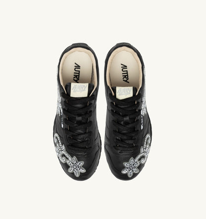 AUTRY WINDSPIN SNEAKERS IN BLACK LEATHER WITH DECORATIONS