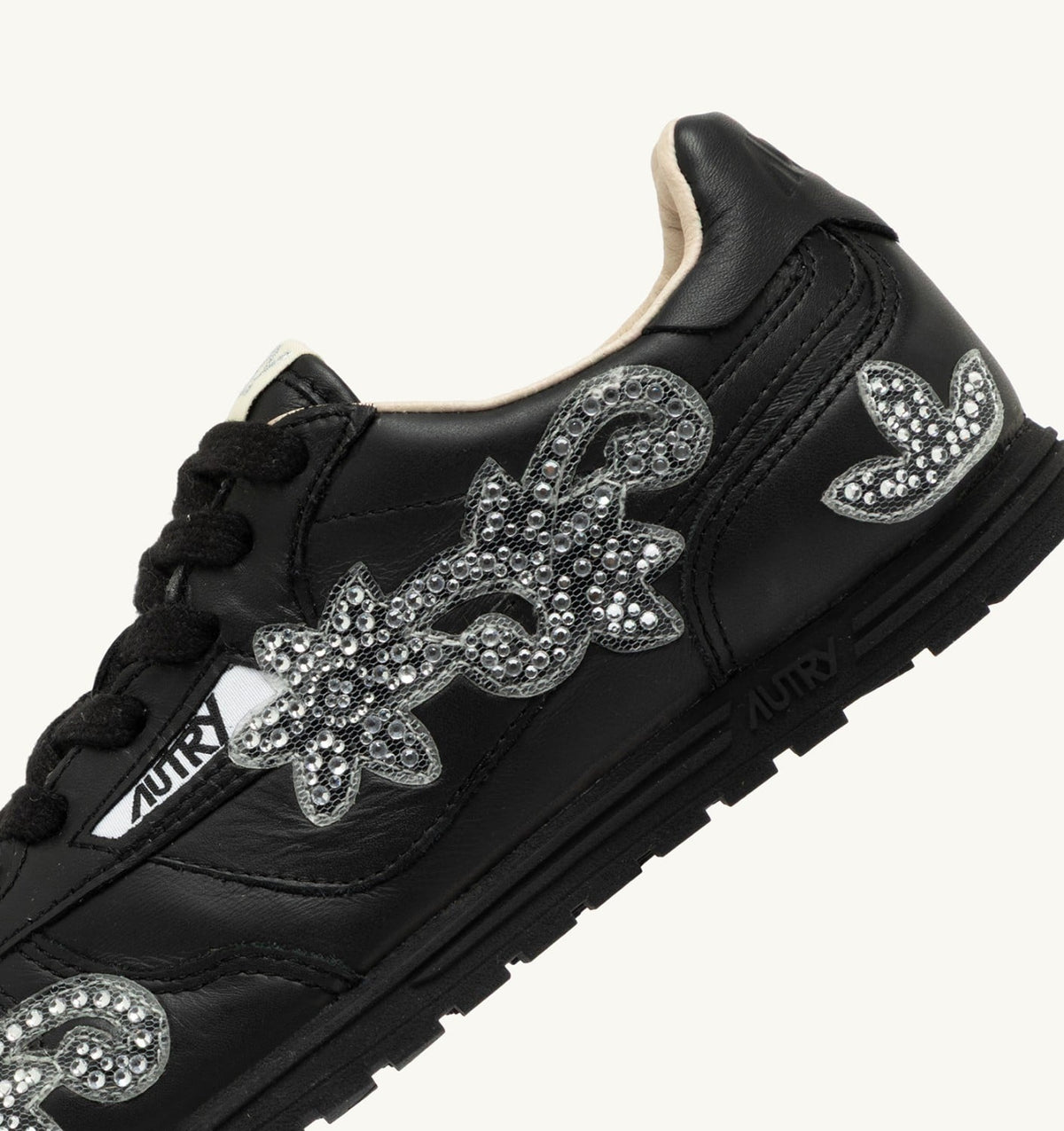 AUTRY WINDSPIN SNEAKERS IN BLACK LEATHER WITH DECORATIONS