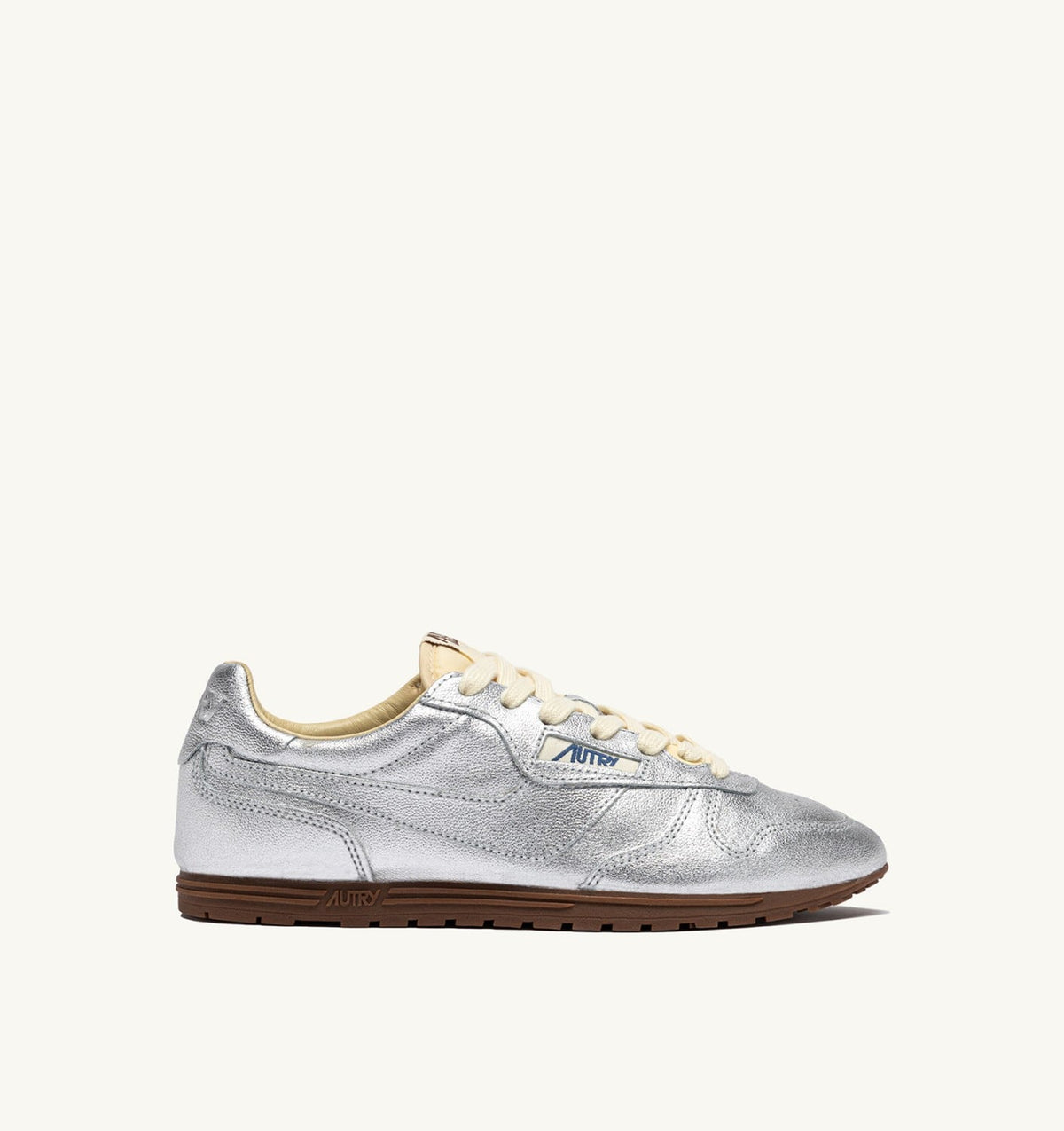 AUTRY WINDSPIN SNEAKERS IN SILVER TONE LAMINATED LEATHER