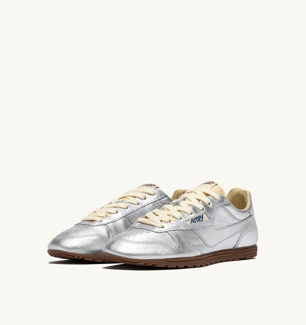 AUTRY WINDSPIN SNEAKERS IN SILVER TONE LAMINATED LEATHER