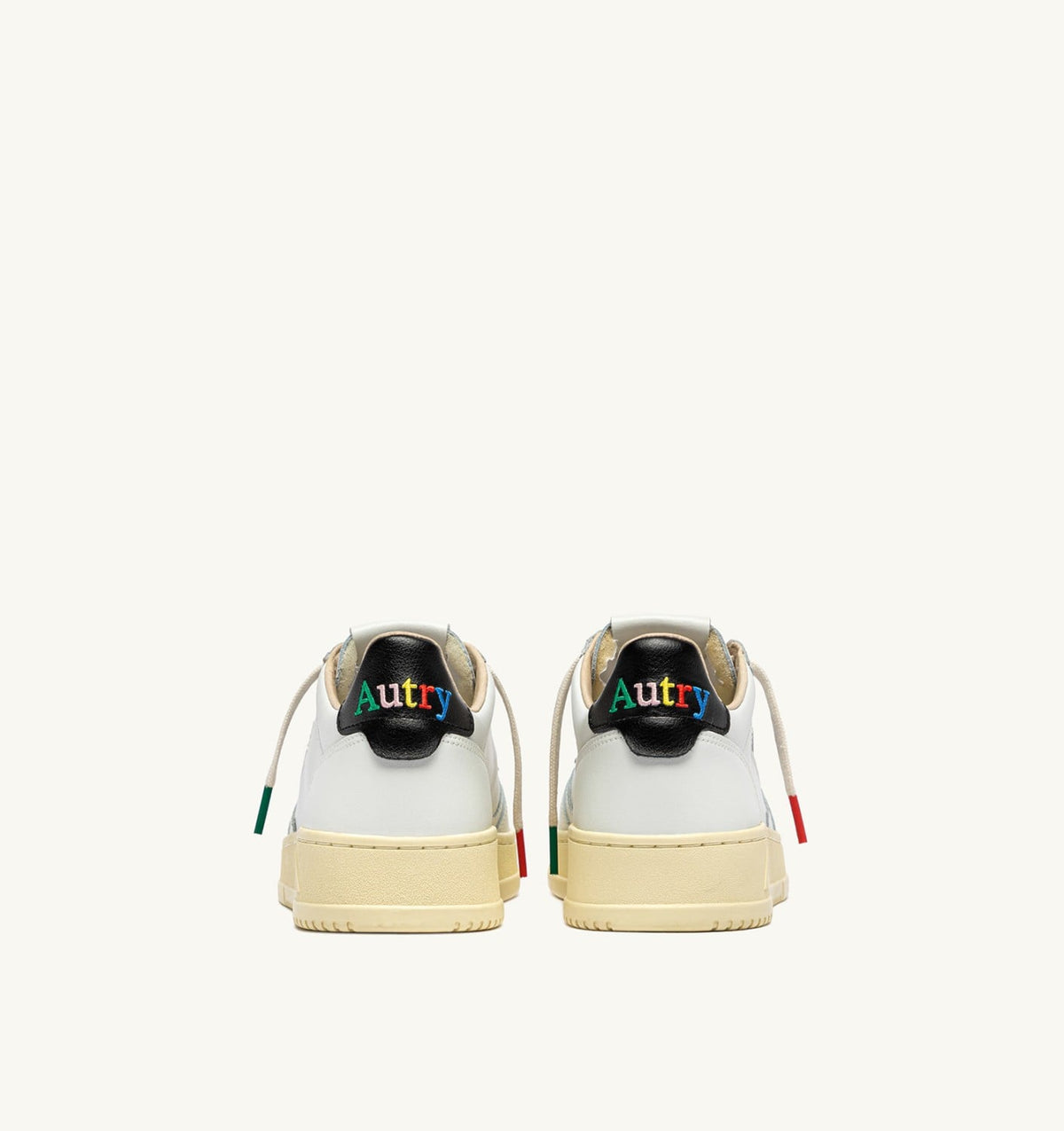 AUTRY MEDALIST LOW SNEAKERS IN WHITE AND BLACK LEATHER