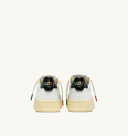 AUTRY MEDALIST LOW SNEAKERS IN WHITE AND BLACK LEATHER