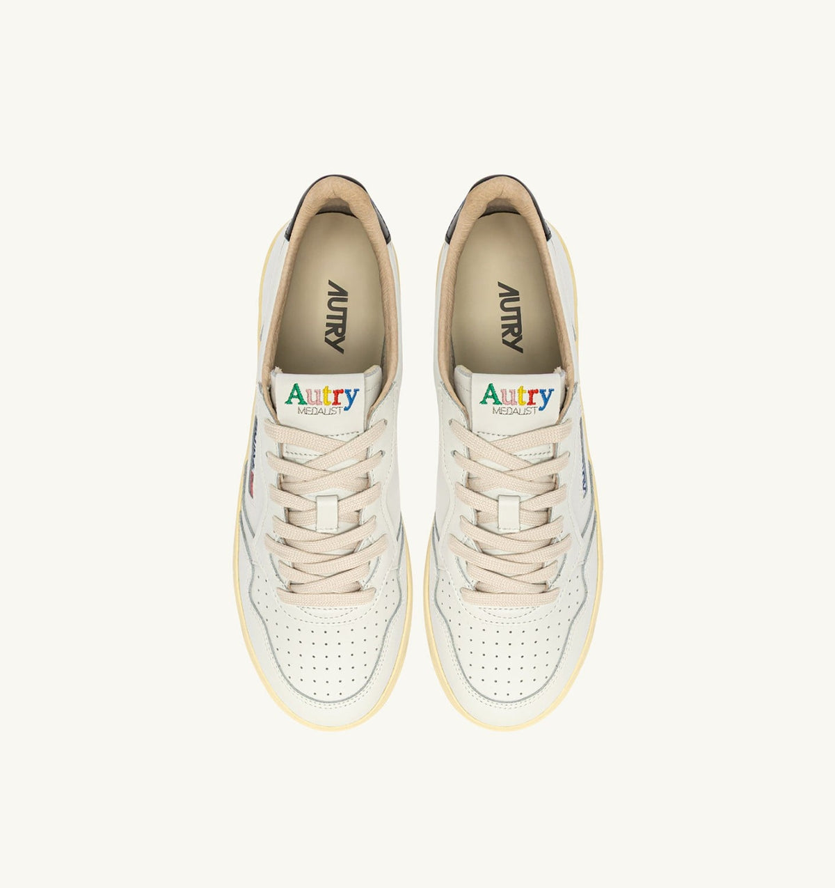 AUTRY MEDALIST LOW SNEAKERS IN WHITE AND BLACK LEATHER