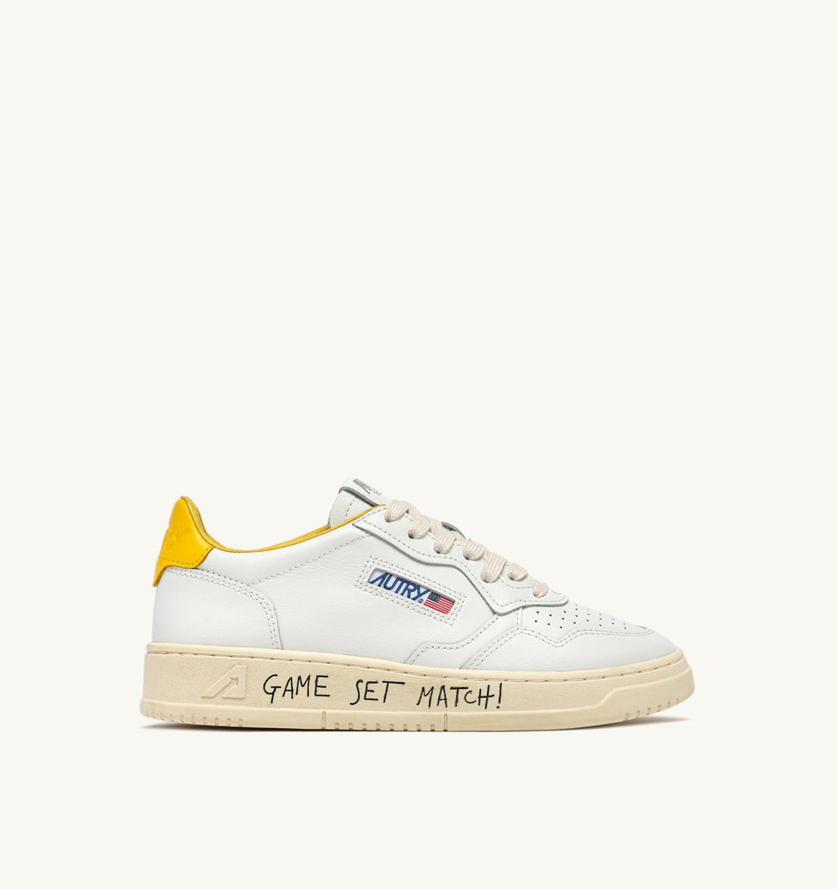 AUTRY MEDALIST LOW SNEAKERS IN WHITE AND SLICKER LEATHER WITH LETTERING
