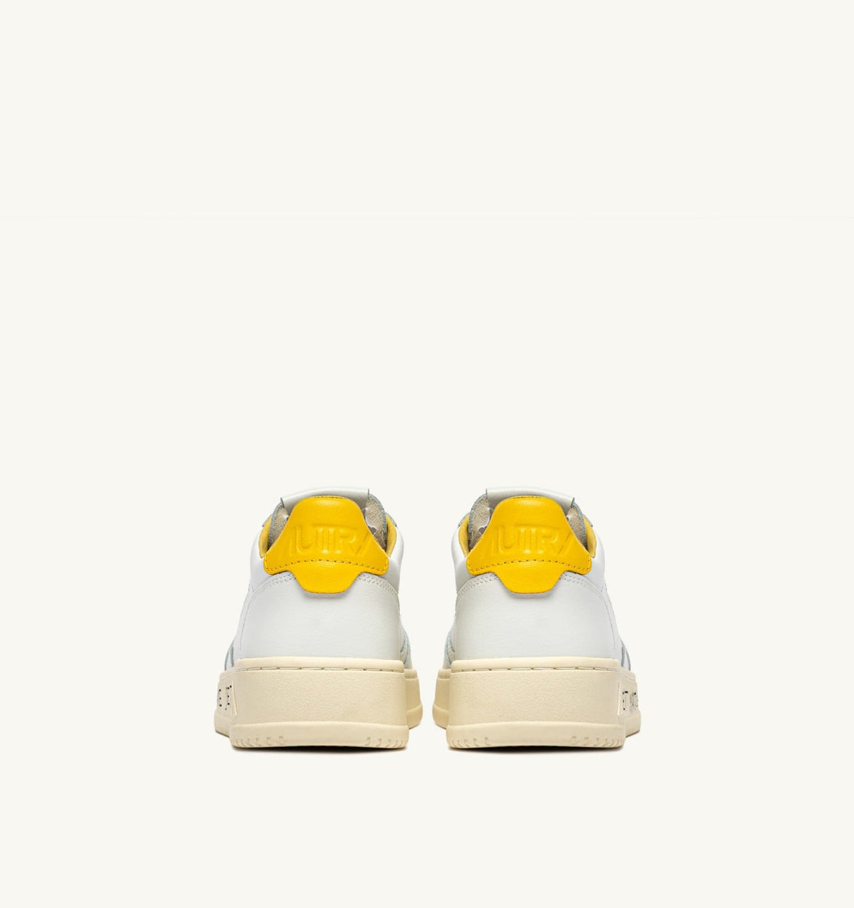 AUTRY MEDALIST LOW SNEAKERS IN WHITE AND SLICKER LEATHER WITH LETTERING