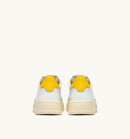 AUTRY MEDALIST LOW SNEAKERS IN WHITE AND SLICKER LEATHER WITH LETTERING