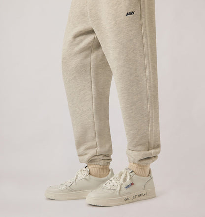 AUTRY MEDALIST LOW SNEAKERS IN WHITE LEATHER WITH LETTERING