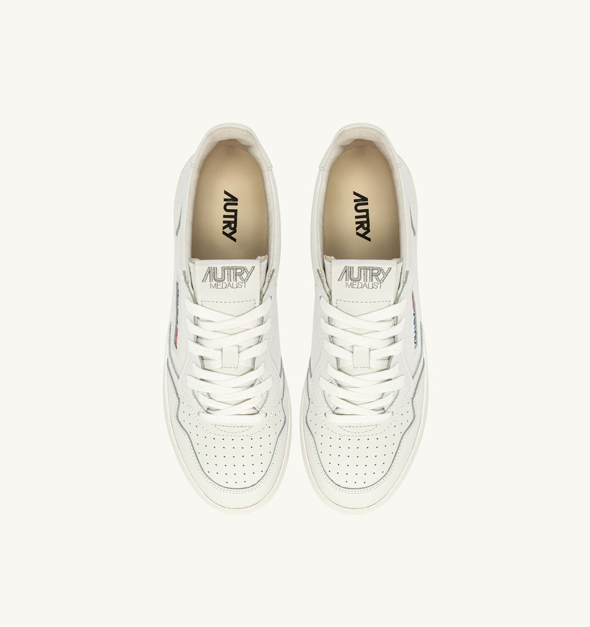 AUTRY MEDALIST LOW SNEAKERS IN WHITE LEATHER WITH LETTERING