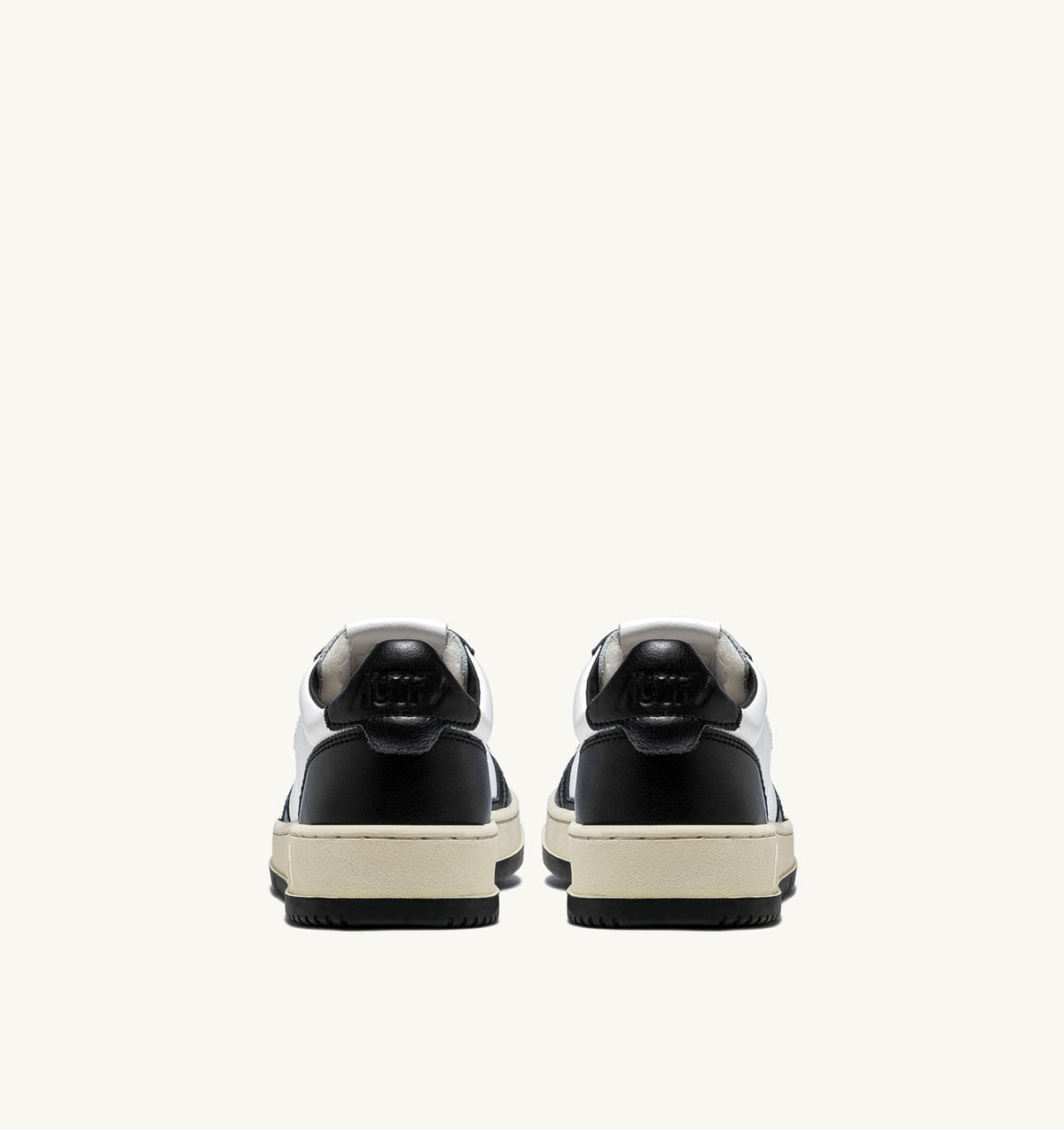 AUTRY MEDALIST LOW BICOLOR SNEAKERS IN WHITE AND BLACK LEATHER