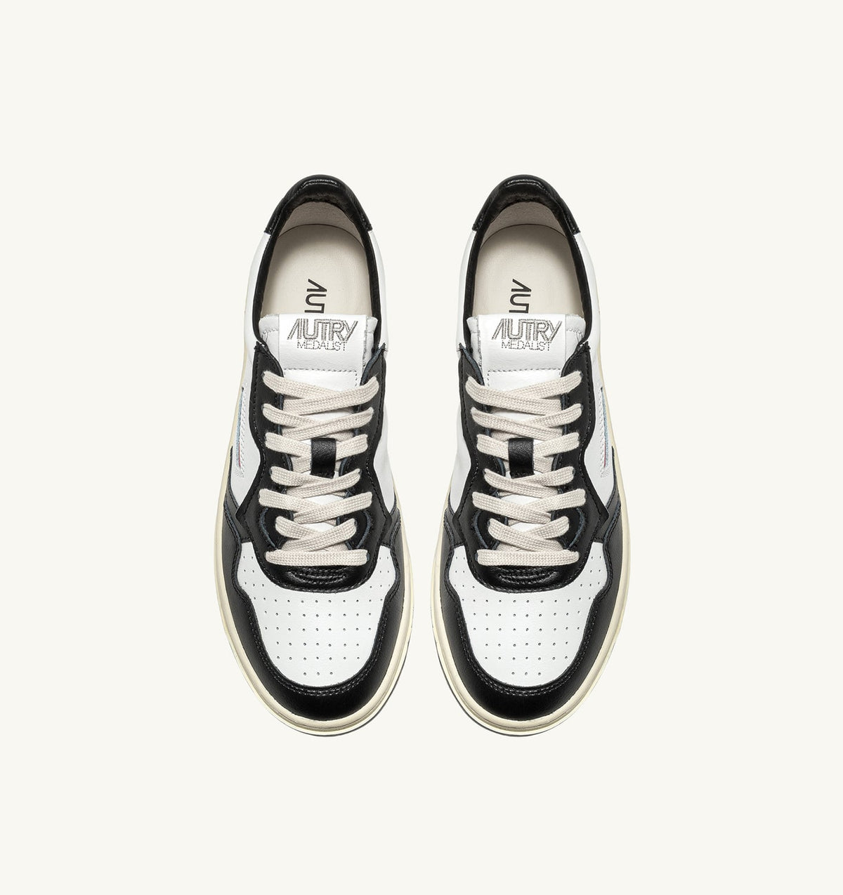 AUTRY MEDALIST LOW BICOLOR SNEAKERS IN WHITE AND BLACK LEATHER