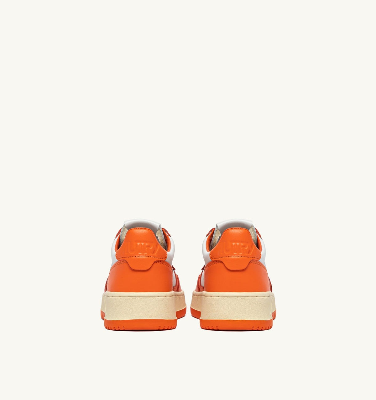 AUTRY MEDALIST LOW BICOLOR SNEAKERS IN WHITE AND PARSIMMON ORANGE LEATHER