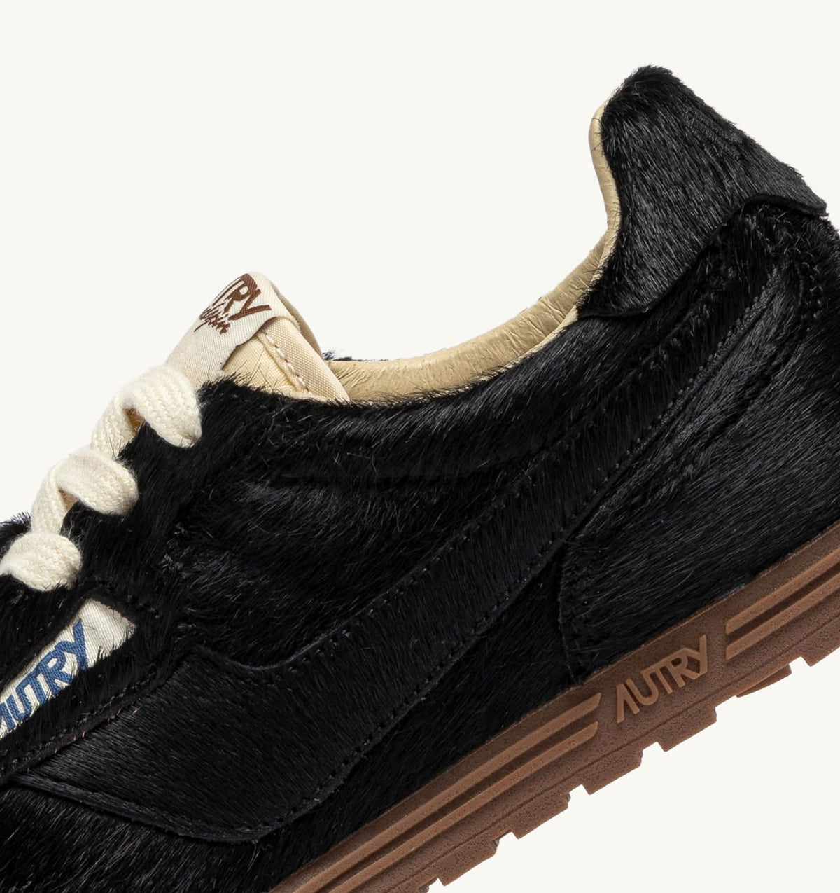 AUTRY WINDSPIN SNEAKERS IN BLACK PONY HAIR EFFECT