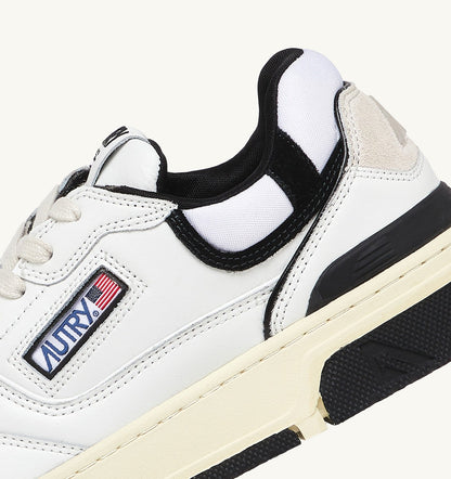 AUTRY CLC LOW SNEAKERS IN WHITE LEATHER AND BLACK SUEDE