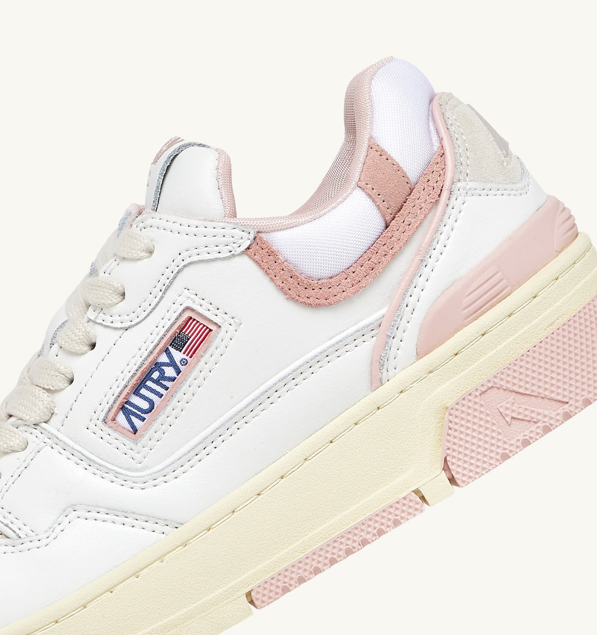 AUTRY CLC LOW SNEAKERS IN WHITE LEATHER AND POWDER PINK SUEDE