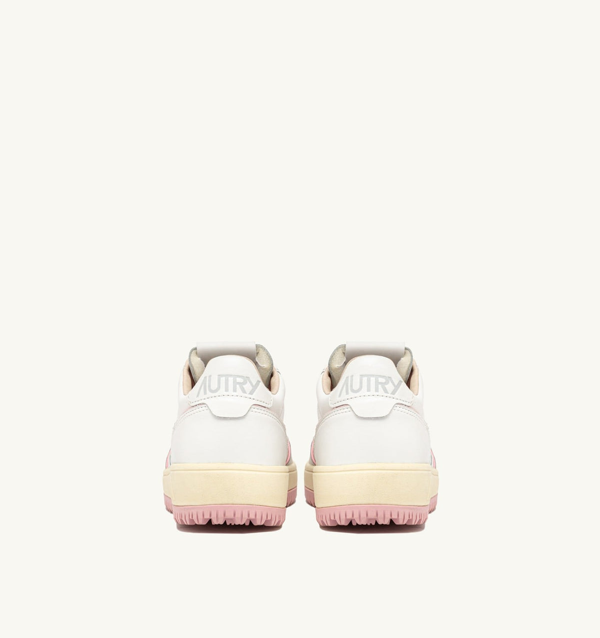 AUTRY GOLF LOW SNEAKERS IN WHITE AND CORAL BLUSH LEATHER