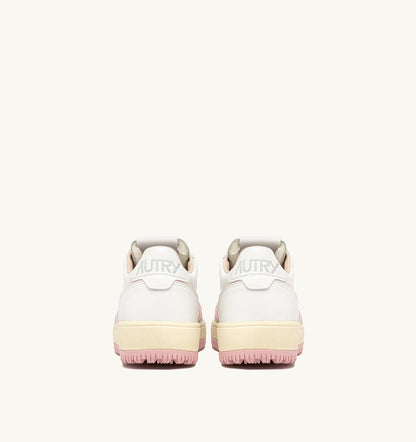 AUTRY GOLF LOW SNEAKERS IN WHITE AND CORAL BLUSH LEATHER