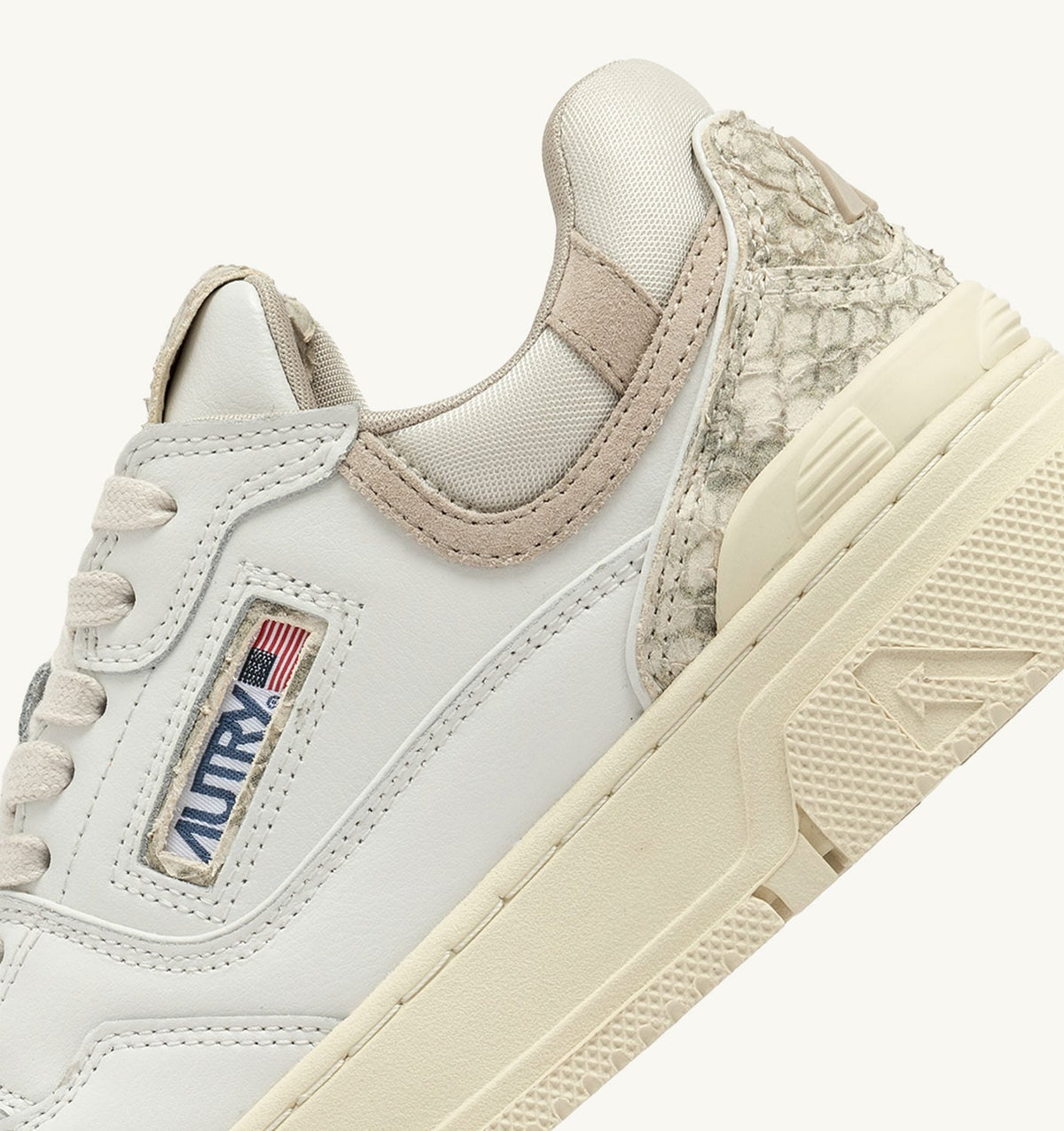 AUTRY CLC LOW SNEAKERS IN WHITE LEATHER WITH SNAKE DIAMOND PRINT